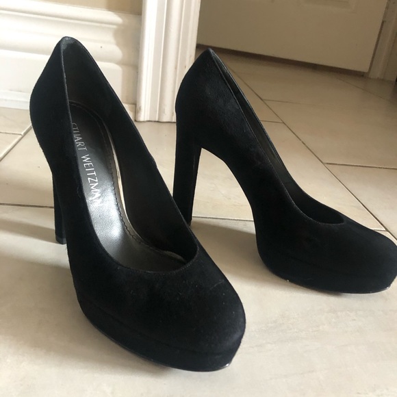 Stuart Weitzman black suede pumps.